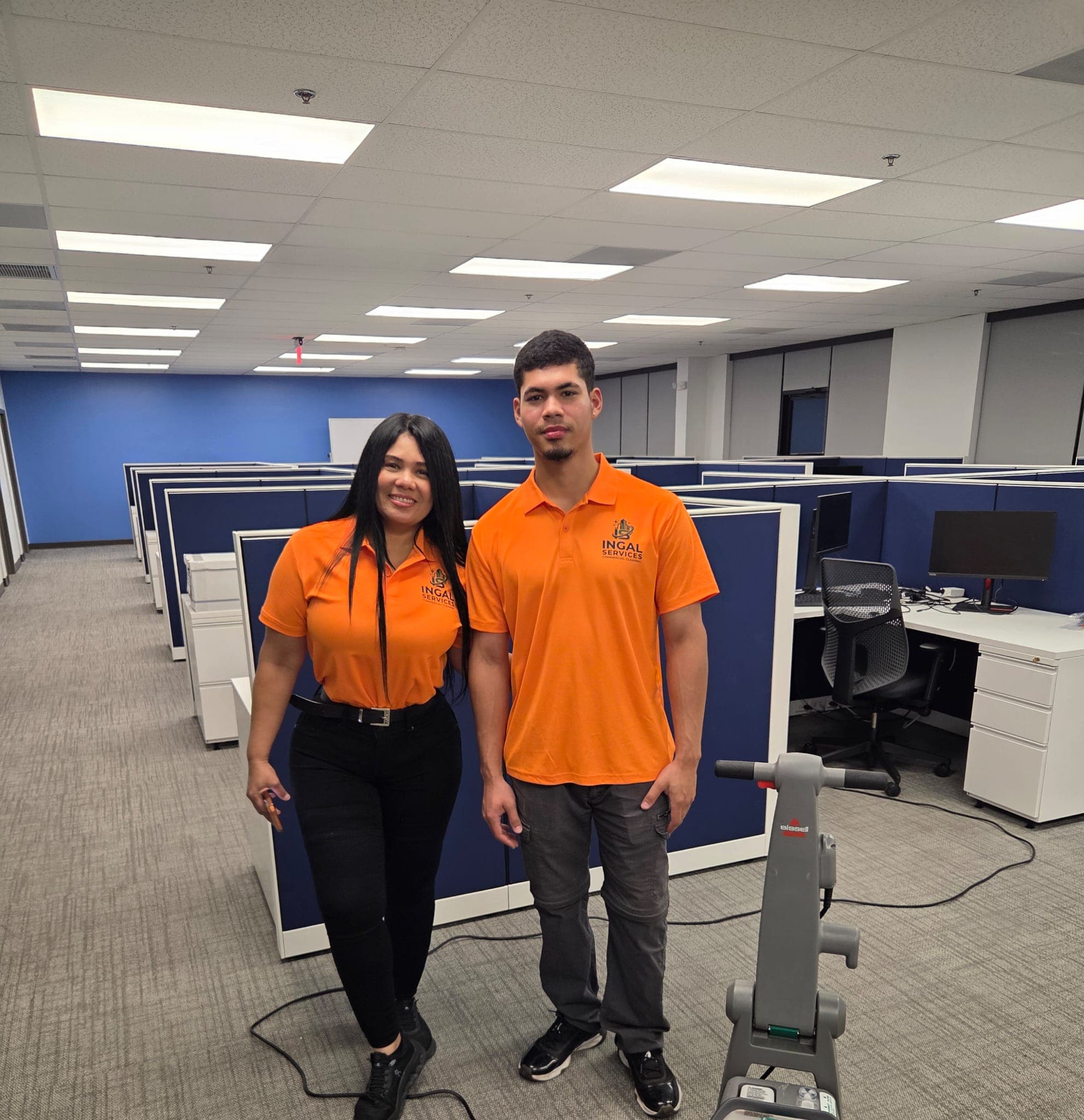 The INGAL SERVICES INC crew standing in a client office in Tampa, Florida